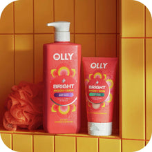 OLLY Bright mood-skin body wash bottles with pump, shown side by side in bathroom shelf