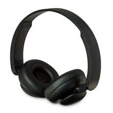Black wireless on-ear headphones, side view with adjustable headband and control buttons
