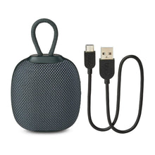Mini rugged Bluetooth speaker with USB charging cables, dark gray fabric grille.