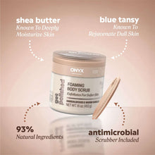 Foaming body scrub jar with included brush scrubber and textured beige gel
