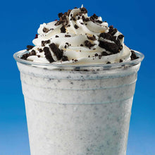 Cookies-and-cream dessert in a cup with chocolate cookie crumbs