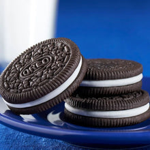 Oreo chocolate sandwich cookies stacked with white cream filling close-up