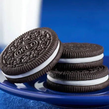 Stack of chocolate sandwich cookies with white cream layers