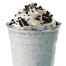 Cookies-and-cream style dessert cup topped with crushed chocolate cookies