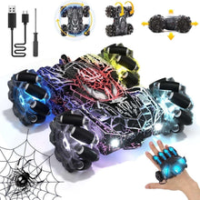 Black and purple RC stunt car with blue LED headlights and chunky all-terrain tires