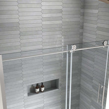 Frameless sliding shower door system with clear glass panel and top rail