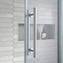 Stainless steel shower door handle set on clear frameless glass panel