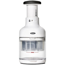 White food chopper with clear container and black top knob
