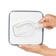 OXO POP container lid open with integrated serving scoop holder