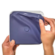 OXO POP container lid with deep purple soft-touch panel and center thumb release