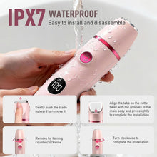 Pink IPX7 waterproof electric trimmer with LED display, held in wet hands
