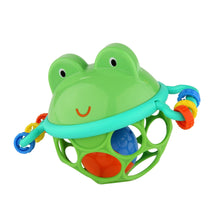 Green frog-shaped infant rattle with jingle bells and colorful handle loops