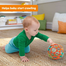Colorful plastic baby rattle ball with clear drum inserts and easy-grip cap