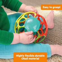 Close-up of easy-grasp baby rattle ball with grippy lid and rainbow ring frame