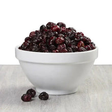 Bowl of dark red dried cranberries