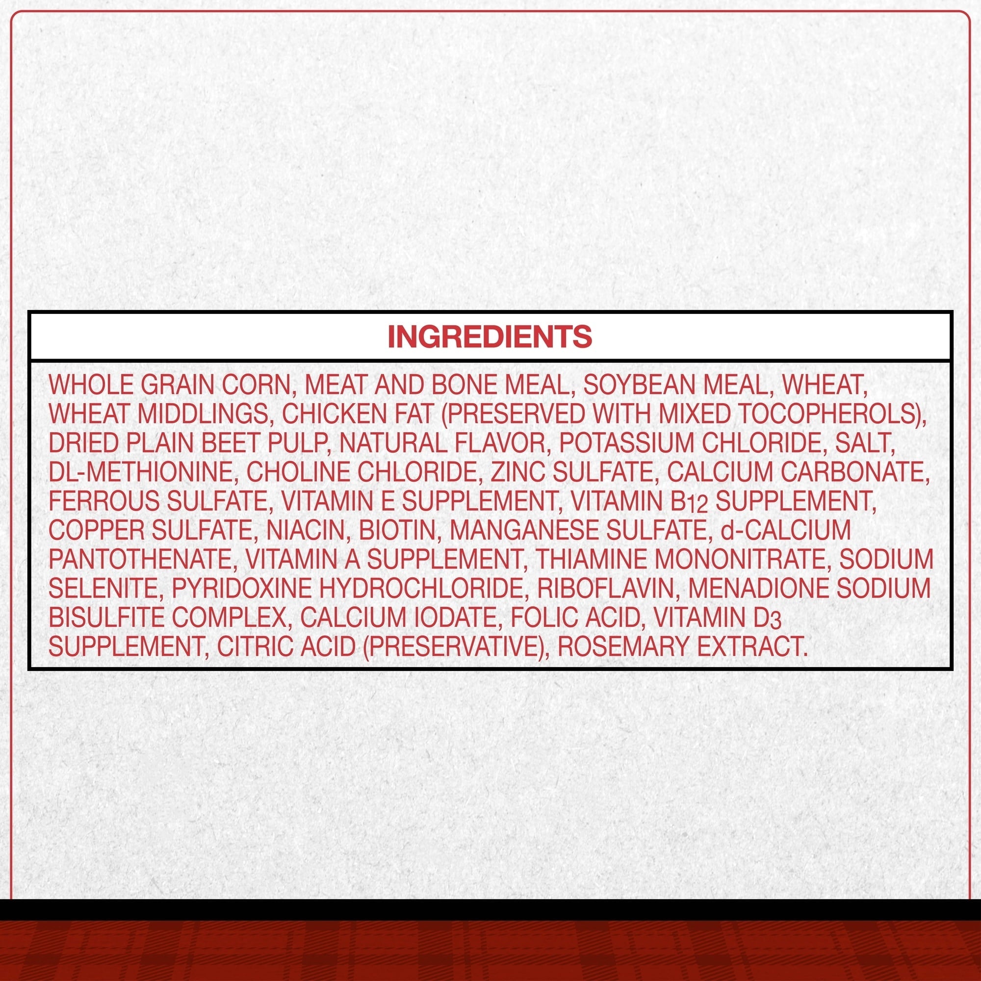 Dry dog food package ingredients panel with whole grain corn and chicken meal list