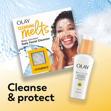 Olay Complete SPF 30 lightweight lotion bottle beside cleanser box