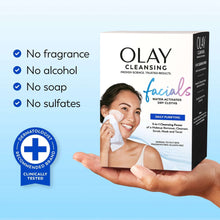 Olay facial cleansing dry cloths box held in hand with no fragrance icon