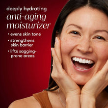 Laughing woman with hands on cheeks, hydrating face moisturizer