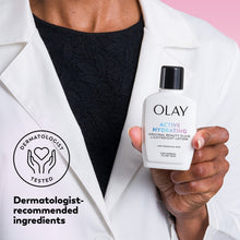 Olay Active Hydrating lotion bottle held in hand beside dermatologist tested icon