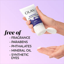 OLAY retinol exfoliating cleanser tube held in hand, with ingredient-free claims