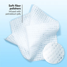 White cleansing face wipes folded with a close-up of textured cloth