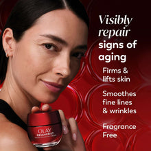 OLAY Regenerist micro-sculpting cream jar held in hand, red glass, fragrance-free