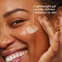 Olay hyaluronic gel being applied to face, white gel streaks on skin