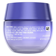 Night recovery cream jar back label with directions on a purple-blue container