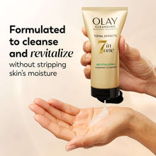 Olay Total Effects foaming face wash tube in hand, gold with black base
