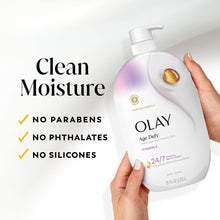 Olay body wash bottle in hand with “Clean Moisture” no parabens no phthalates