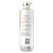 Olay body wash bottle with white pump, gold collar, on a back label