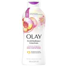 Olay Fresh Radiance body wash bottle with purple cap and Peach & Cherry Blossom label