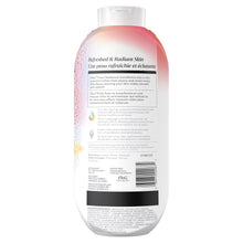 Body wash bottle with white back label and barcode; sealed cap visible
