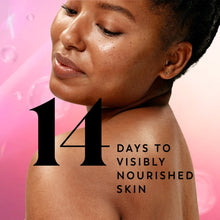 Lathered shoulder skin with body wash bubbles, “14 days” nourishment text