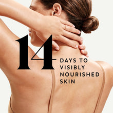 Body wash massaging on back and shoulders, hands spreading lather