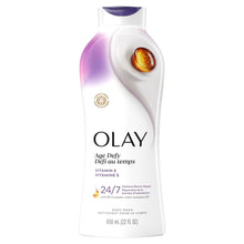 OLAY Age Defy body wash bottle, white with purple cap and golden emblem