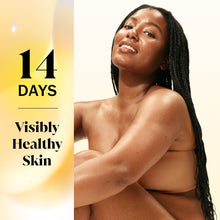Moisturizing body wash, woman with suds on shoulder and upper chest