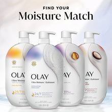 Set of body wash bottles with white pump tops and speckled exfoliant design on labels