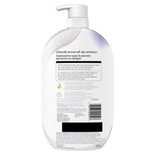 Olay Ultra Moisture exfoliating body wash bottle with ingredient information, pump