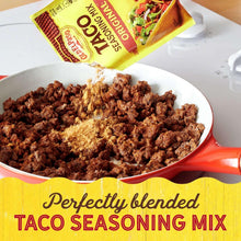 Old El Paso taco seasoning mix with cooked crumbled beef and open packet
