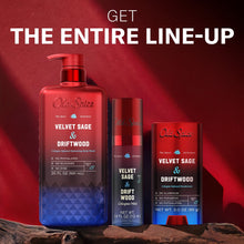 Body wash and containers with red pumps, blue labels for Velvet Sage & Driftwood