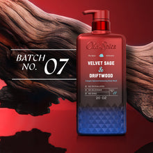 Body wash bottle with red pump and blue label, Batch No. 07 Velvet Sage & Driftwood