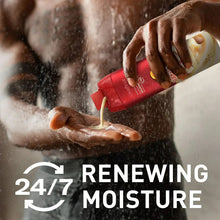 Old Spice body wash bottle in hands, splashing water