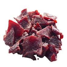 Dried beef jerky pieces, maroon-red and dark brown