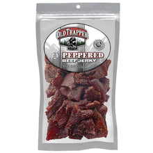 Peppered beef jerky bag with Old Trapper branding and dried jerky pieces