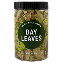 Olde Thompson bay leaves in a clear 2 oz jar with a black lid and green label.