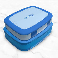 Blue Bentgo lunch box with smooth lid and side latches, closed