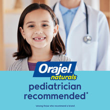 Smiling child holding Orajel Naturals training toothpaste; pediatrician recommended