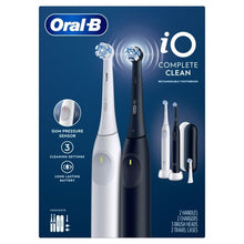 Oral-B iO Complete Clean toothbrush box showing white and black rechargeable handles